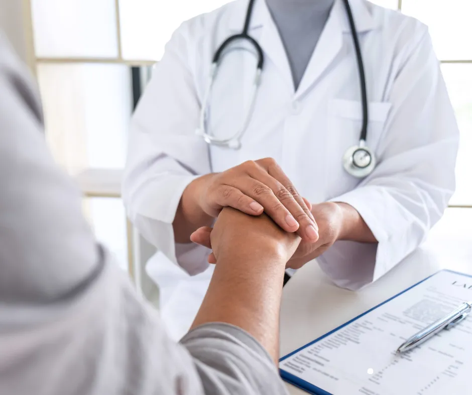 Doctor discussing COGNISION System testing with a patient