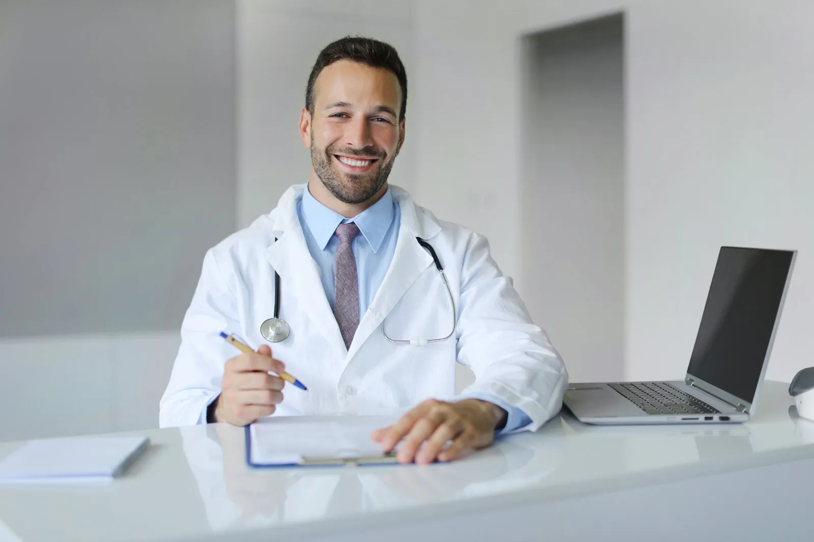 Young doctor in office for TM Flow article