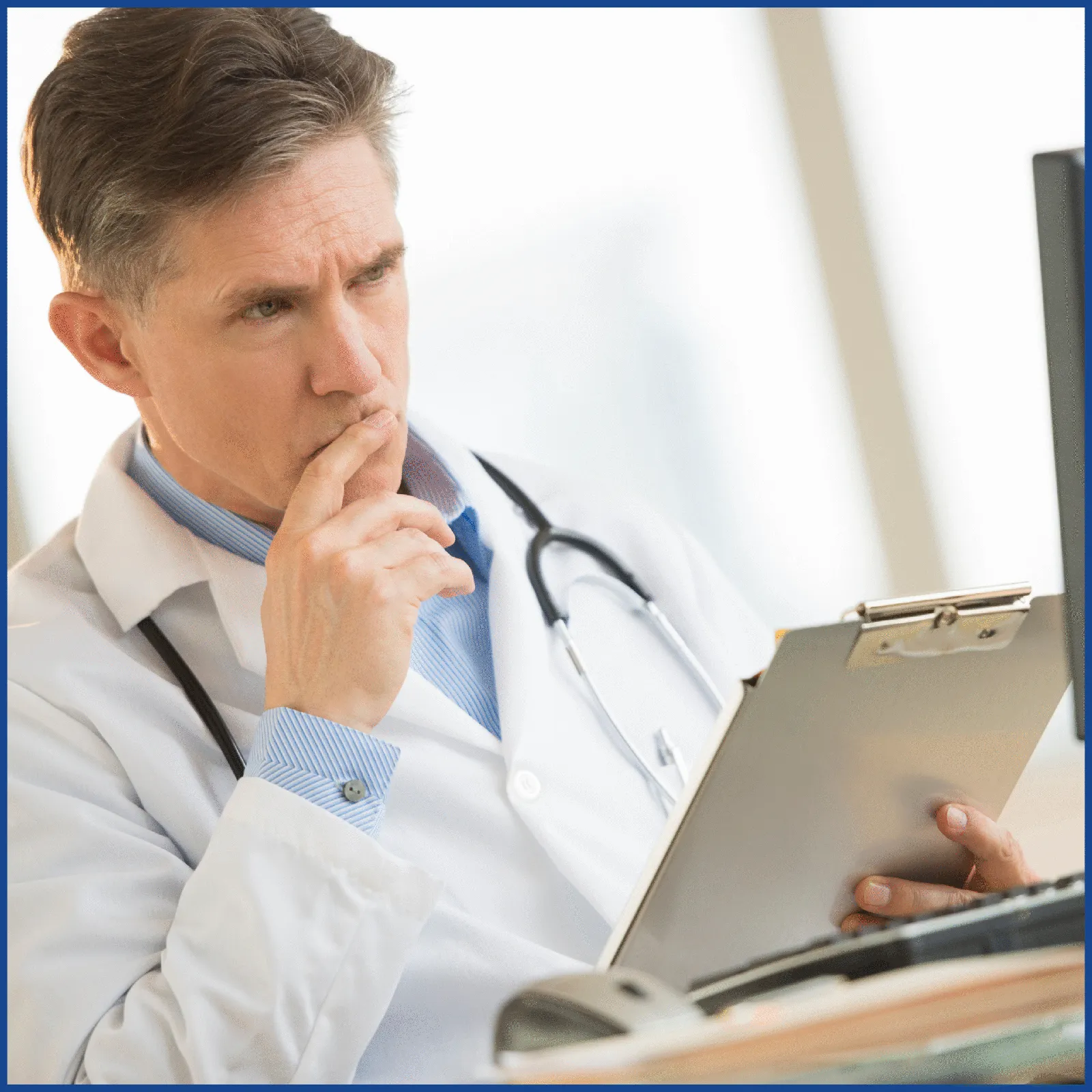 Doctor reviewing TM Flow System test data