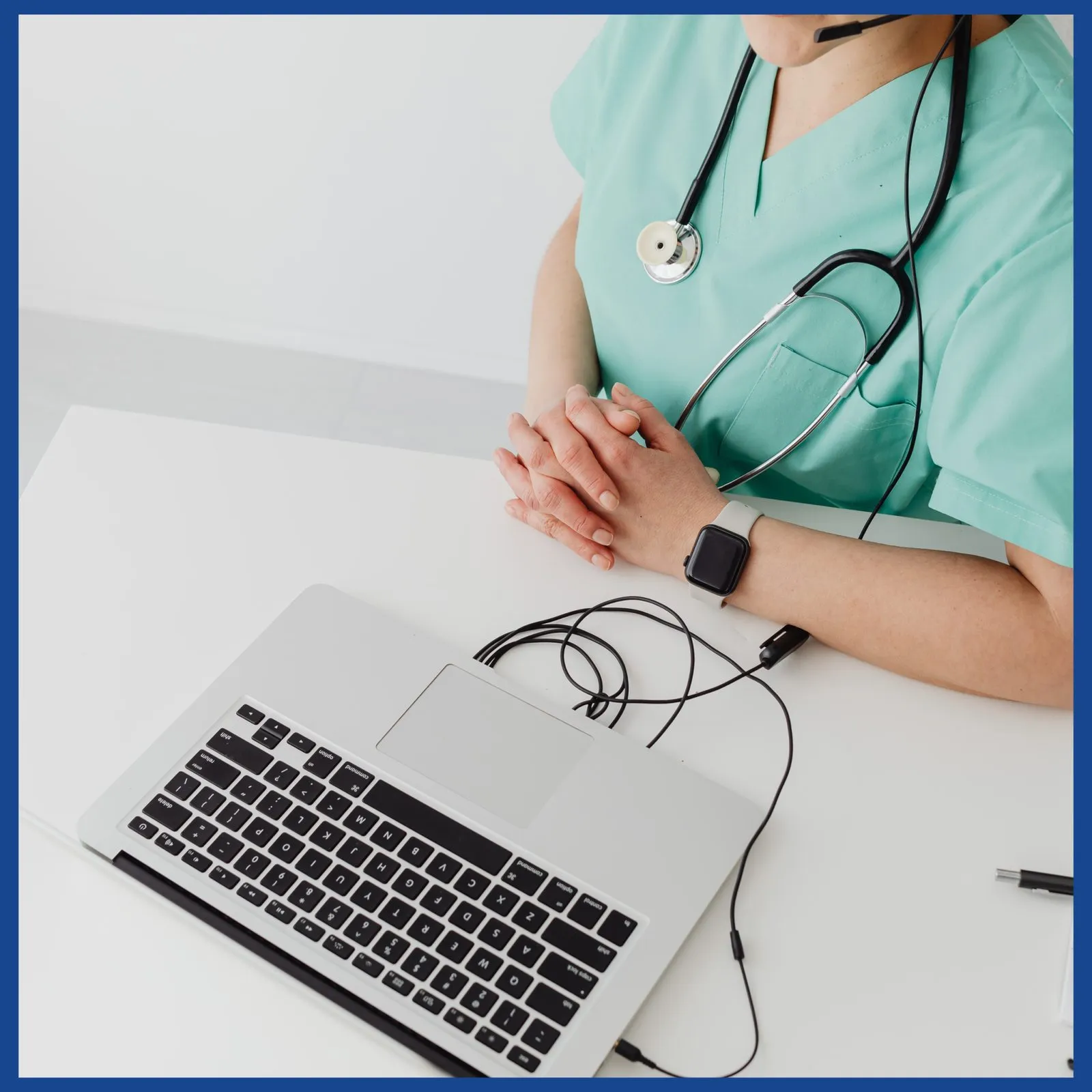 Nurse updating patient records after TM Flow System testing