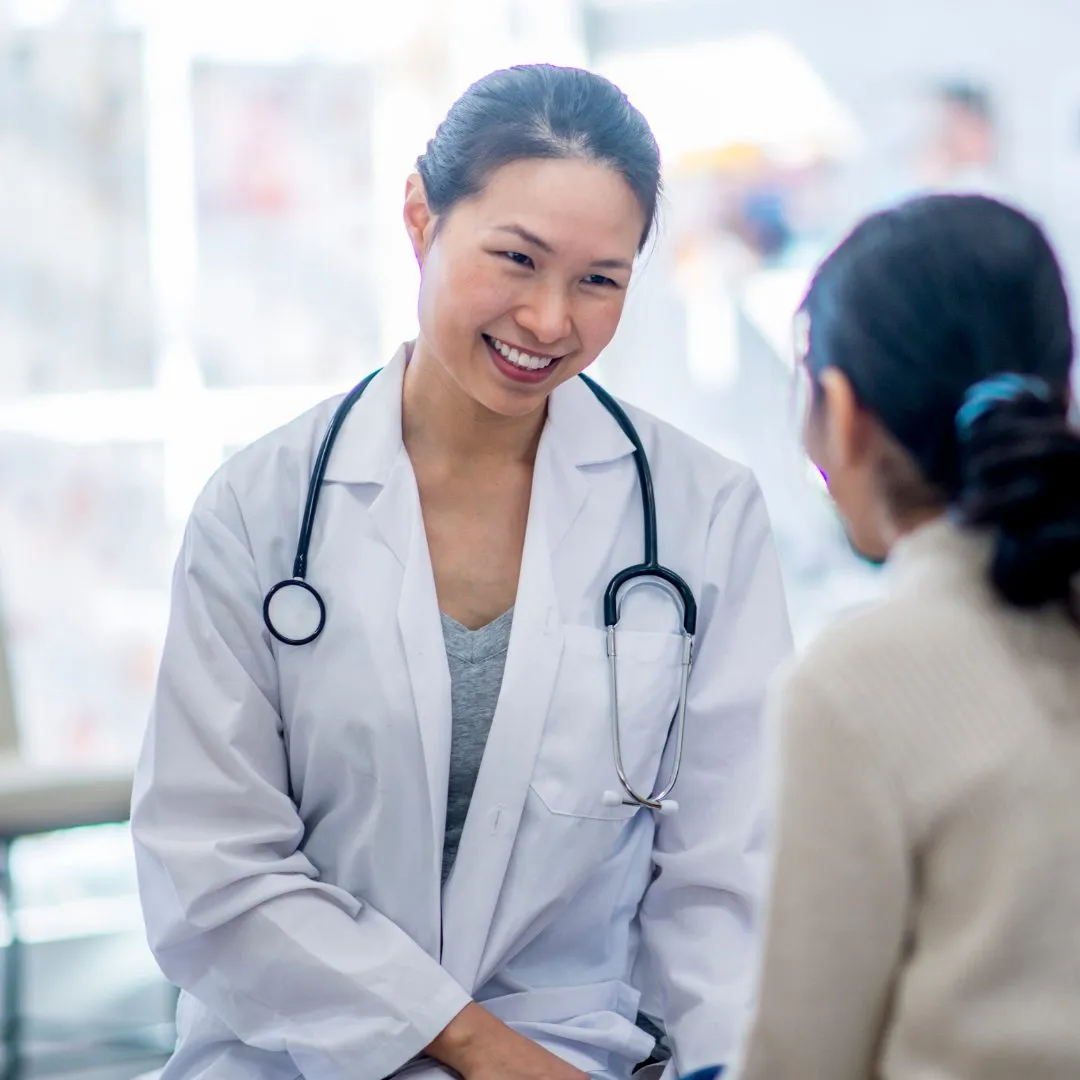 Doctor giving patient good news 