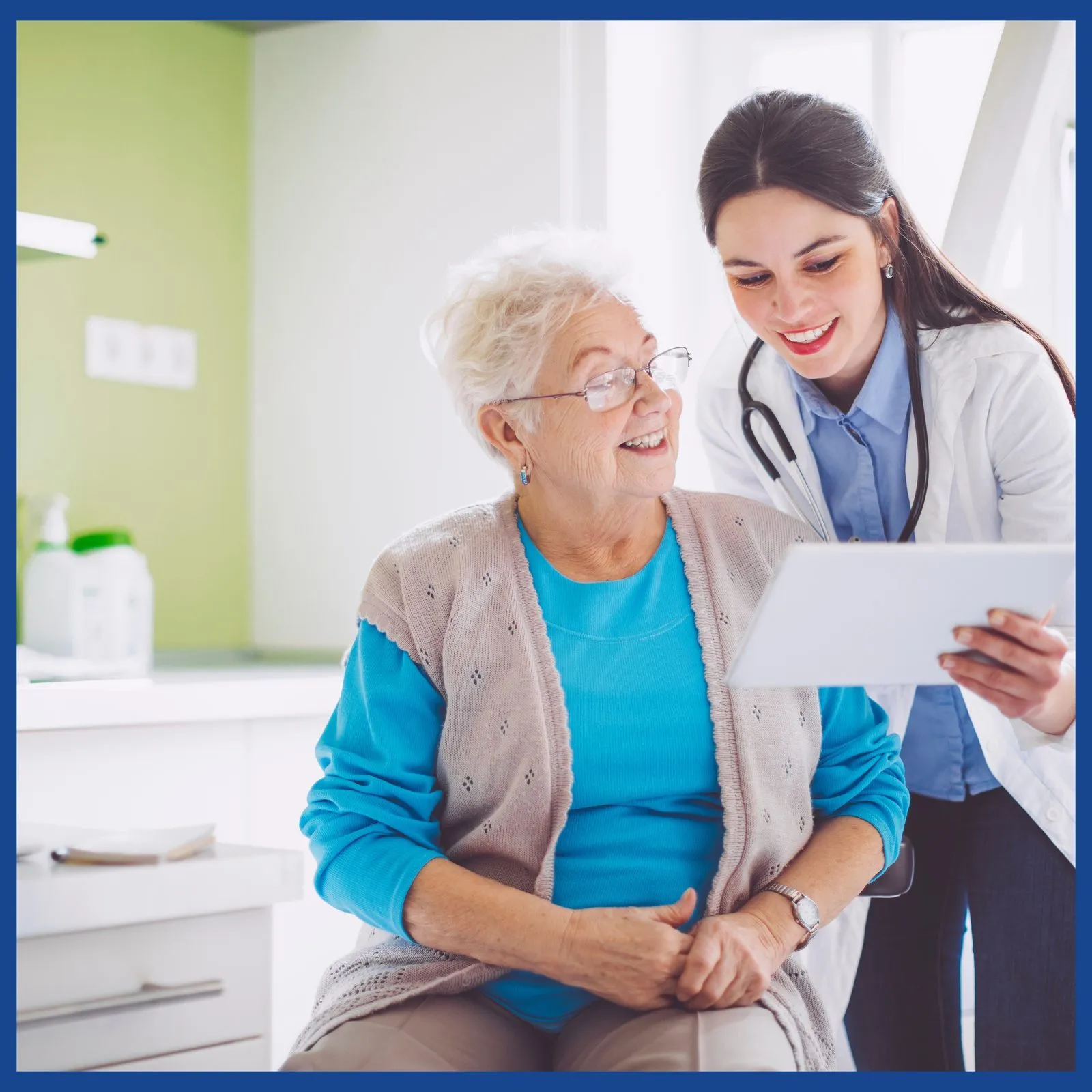 Doctor seated with a senior patient discussing VAT ENGPlus System fall-risk testing