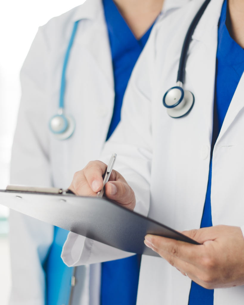 Using the COGNISION® System to Establish Cognitive Baselines in Patients at Risk for Dementia featured image with 2 doctors